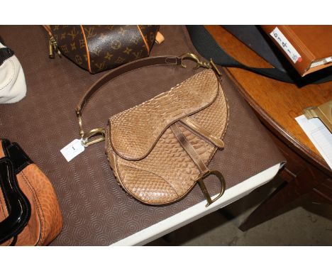 A Christian Dior Python saddle bag