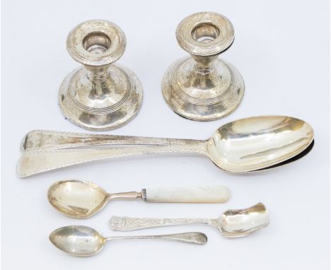 A collection of silver items to include; a pair of George III silver table spoons, each with engraved stems, hallmarked by Ge