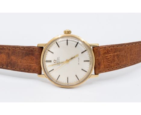 Omega-a gentleman's 9ct gold Omega De Ville vintage wristwatch, comprising a signed silvered dial, applied baton markers, cas