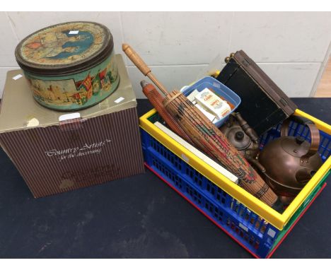  A mixed lot of metalware and other items to include; two copper kettles, ladle, candle holder, other brass pieces, along wit