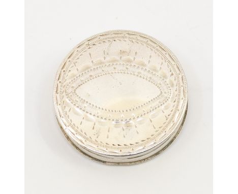 A George III silver circular patch box and cover, engraved with oval decorative motif, hallmarked by Samuel Pemberton, Birmin