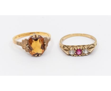 A citrine and 22ct gold ring, size N1/2, total gross weight approx 3.2gms, together with a three stone 9ct gold ring, size N,