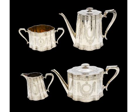 A Victorian silver four piece tea set consisting of tea pot, coffee pot, twin handled sugar bowl and milk jug, all with elabo