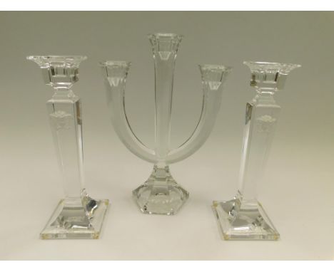 A pair of Rosenthal "Versace" range stylish 20th century candlesticks, each with frosted moulded heads to stems, splayed squa