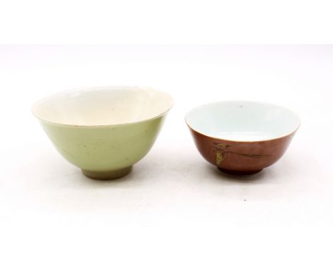 A Chinese Kangxi style bowl, cafe au lait exterior with bird and foliage decoration, underglaze blue mark to underside, appro