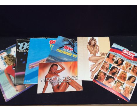 A collection of vintage newpapers, page 3 calenders and posters.