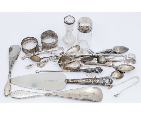 A mixed collection of silver flatware to include; a George V silver bread fork, hallmarked by C.T. Burrows, Birmingham, 1914,