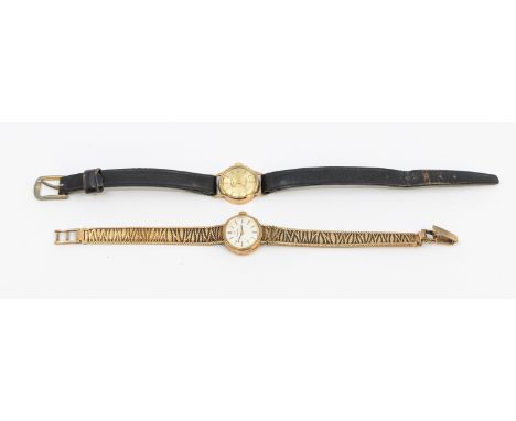 Omega- a ladies vintage 9ct gold Omega wristwatch, comprising a small round signed silvered dial with applied baton markers, 