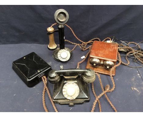  A collection of vintage early 20th Century telephones, wall and table top.