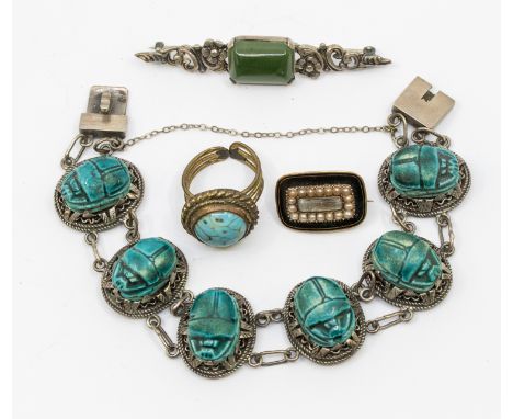 A Georgian mourning brooch, rectangular shape inset to the centre with a glazed hair compartment, within a border of half pea
