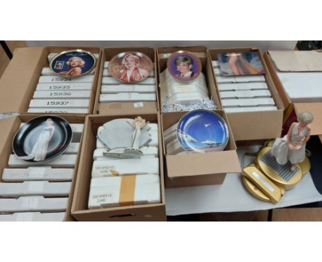 A collection of Marilyn Monroe ephemera to include telephone, cabinet plates .  9 boxes sold as seen