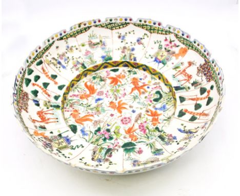 A modern Chinese large famille verte circular bowl, cut card border with deep recess to centre, the centre painted with carp,