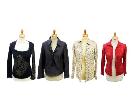  An Isabel-de-Pedro (Spanish), size 14, black top in man-made fabric with a pale gold emblem design on the front and sleeves.