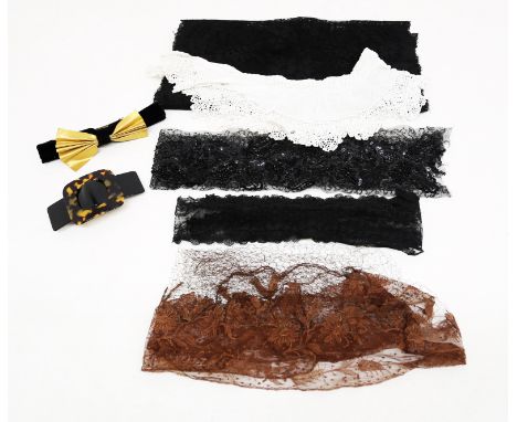  A small collection, including: black tulle/lace with a sequin decoration; a piece of black Chantilly lace, probably late 193