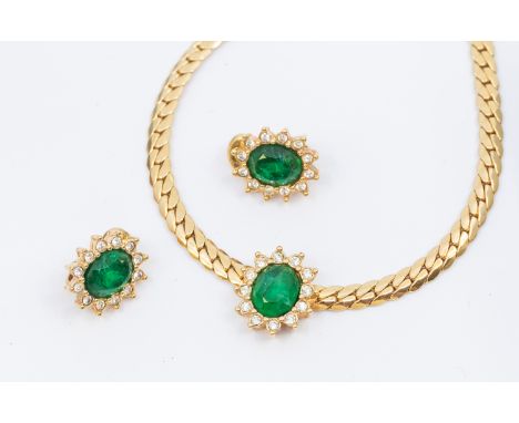 Christian Dior- a vintage paste set 'emerald' gilt metal necklace along with a matching pair of clip on earrings, approx leng