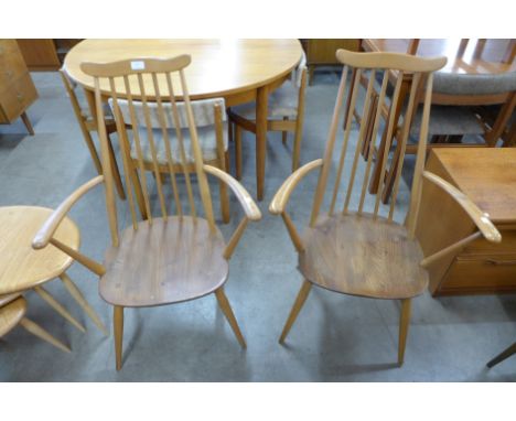 A pair of Ercol Blonde chairs 