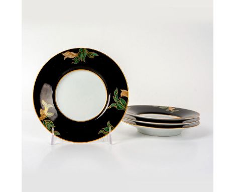 Lovely set of porcelain saucers decorated with green and brown flowers on black ground with gilded edges. Fitz and Floyd back