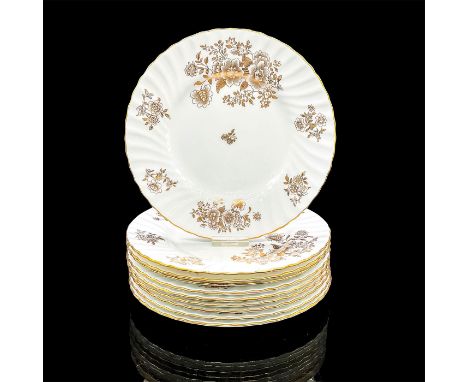 Eight white plates with elegant gold floral design and rim. Royal Minton backstamp. Dimensions: 0.75"H x 9" diaManufacturer: 