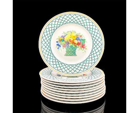 Ten porcelain plates in a vibrant green crisscross pattern with a basket of fruit in the center. Villeroy &amp; Boch backstam