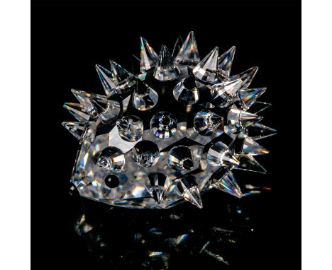 Clear spiney body with black button eyes and nose. 7669 NR 035 000. Swarovski backstamp. This item has its original box: 3.25