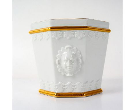White and gold gilded planter embossed with detailed sun faces on both sides and scroll design border. Made in Portugal backs