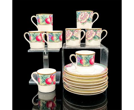 Eight bone china espresso cups and saucers with a lively green, purple, blue and mauve floral and fruit design, gold rim. Roy