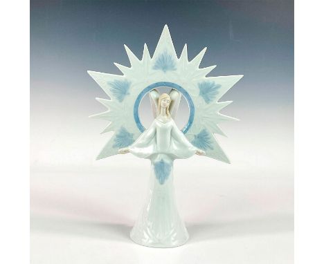 Glossy finish; Lladro backstamp. Artist: Francisco PolopeIssued: 1997 - 1998Dimensions: 7.75"L x 3.5"W x 10.5"HManufacturer: 