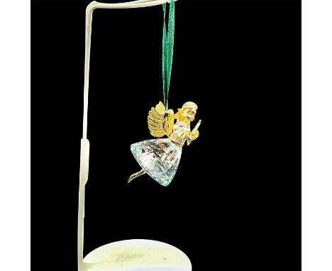 Clear crystal angel with harp. Gold accents on body and wings, on green satin ribbon. 9443 NR 980 001. This item has its orig