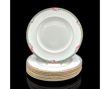 Eight bone china plates with a lively green, purple, blue and mauve floral and fruit design, gold rim. Royal Doulton backstam