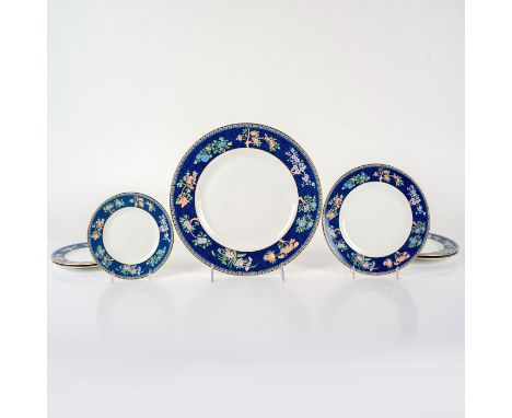 Blue cross stitch design with florals. Set includes 3 saucers 5.75" dia., 3 salad plates 7.75"dia., and 1 dinner plate 10". W