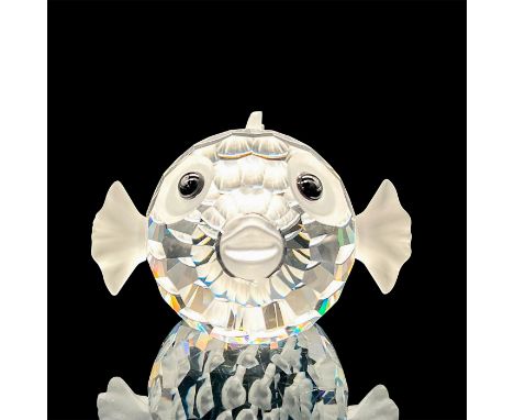 Body is clear crystal with frosted fins, eyes and mouth. Black inset eyes. 7644 NR 030 000. Swarovski backstamp. This item ha