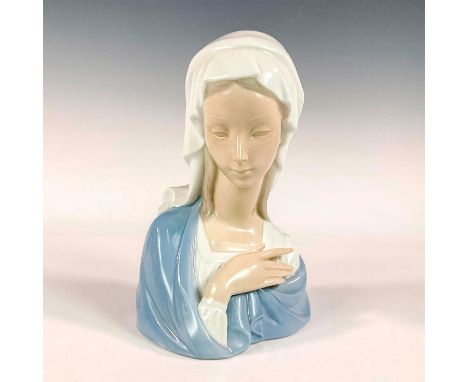 Glossy finish; Lladro backstamp. Artist: Vicente MartinezIssued: 1969 - 2001Dimensions: 8.75"H x 5.5"WManufacturer: LladroCou