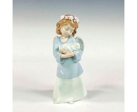 Glossy finish; Lladro backstamp. Artist: Begonia JaureguiIssued: 2002Dimensions: 3"L x 3"W x 7"HManufacturer: LladroCountry o