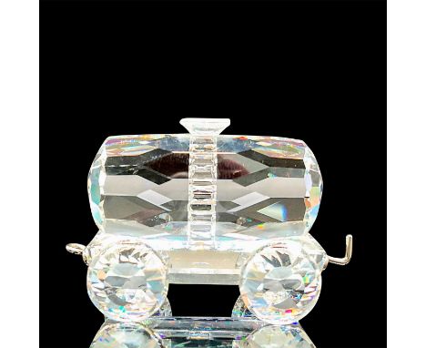 A clear faceted figure of a train carriage. Swarovski mark. This item has its original box: 3.25"W x 3.75"H Artist: Gabriele 