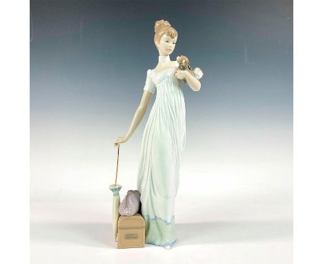 Glossy finish; Lladro backstamp. Artist: Regino TorrijosIssued: 2001Dimensions: 4"L x 4"W x 14"HManufacturer: LladroCountry o