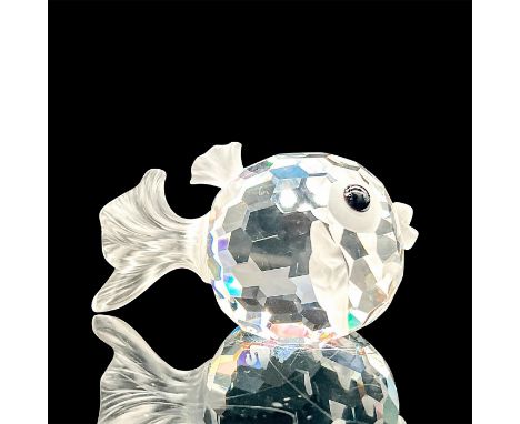 Depicts a mini blowfish made of clear crystal with fogged crystal used for the fins and tail. This item has its original box.