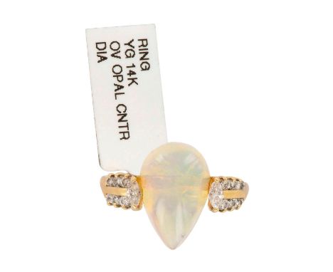 Beautiful Art Deco style ladies cocktail ring with a tear drop shape opal that measures 16.10mm x 11mm x 6mm and diamonds on 