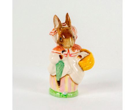 Depict a brown bunny in a dress and bonnet holding a green umbrella and a wicker picnic basket. Beswick backstamp. Dimensions