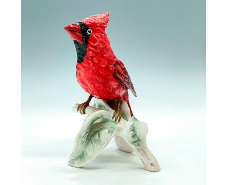 Matte figurine of a red cardinal bird. Underside marked with CV 111 and Goebel backstamp. Issued: c. 1970sDimensions: 5.75"L 