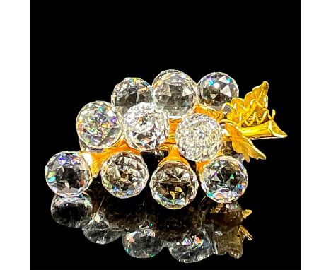 A cluster of clear grapes attached to a steam with leaves in a gold finish. Swarovski mark. This item has its original box: 5
