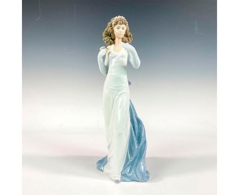 Glossy finish; Lladro backstamp. Artist: Regino TorrijosIssued: 1999 - 1999Dimensions: 12.25"H x 4.75"WManufacturer: LladroCo