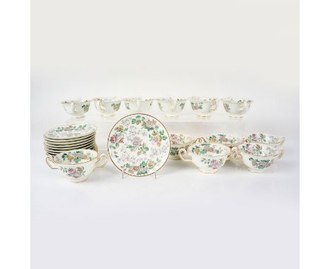 Includes 12 footed cream soup bowls and 12 saucers decorated with purple and yellow flowers with green and brown leaves, gild