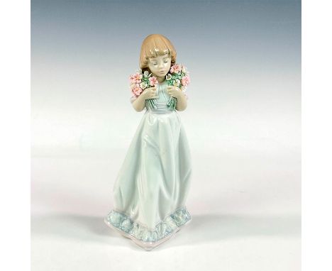 Glossy finish; Lladro backstamp. Artist: Juan HuertaIssued: 1987 - 1987Dimensions: 8.75"H x 3.5"WManufacturer: LladroCountry 