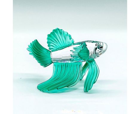 Fish has clear body. Frosted nose. Black and yellow eyes. Green satin, ribbed fins.7644 NR 000 013. Swarovski backstamp. This