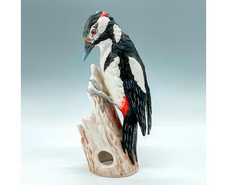 Great spotted black, white and red woodpecker on a tree. Goebel backstamp. Issued: 1972-1979Dimensions: 3.5"L x 2.5"W x 7.25"