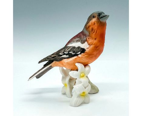 Orange, gray, brown bird sitting ontop of a pale green branch with flowers. Goebel backstamp and sticker. Issued: 1972 to 197