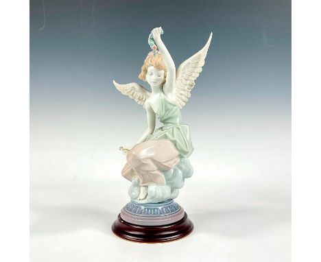 Glossy finish; Lladro backstamp. Includes a base. Base measures: 4.25" dia. Artist: Salvador DebonIssued: 1985 - 1988Dimensio