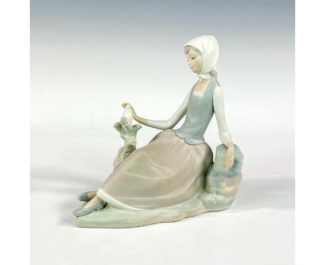 Matte finish; Lladro backstamp. Artist: Vicente MartinezIssued: 1969 - 1991Dimensions: 6.5"L x 4"W x 6.5"HManufacturer: Lladr