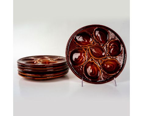 Hand glazed mid century plates in a chestnut coloration. St Clement France impressed. Dimensions: 10â€dia.Manufacturer: St. C