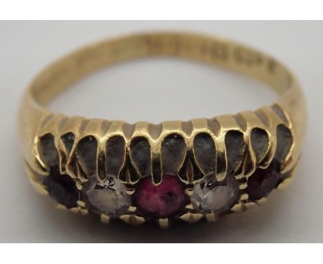 18ct ruby and diamond set ring, size K/L, 3g. P&amp;P Group 1 (£14+VAT for the first lot and £1+VAT for subsequent lots)